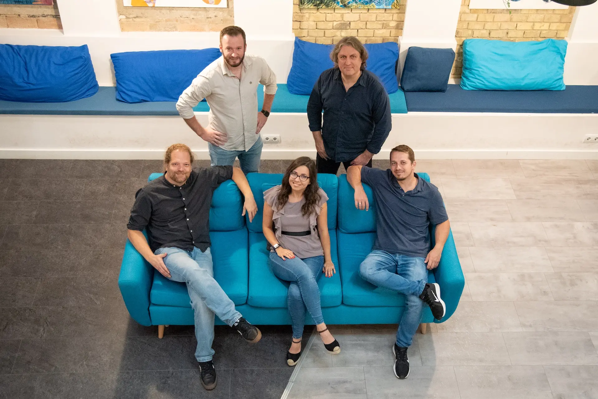 The SignCoders team — five collaborators in their studio